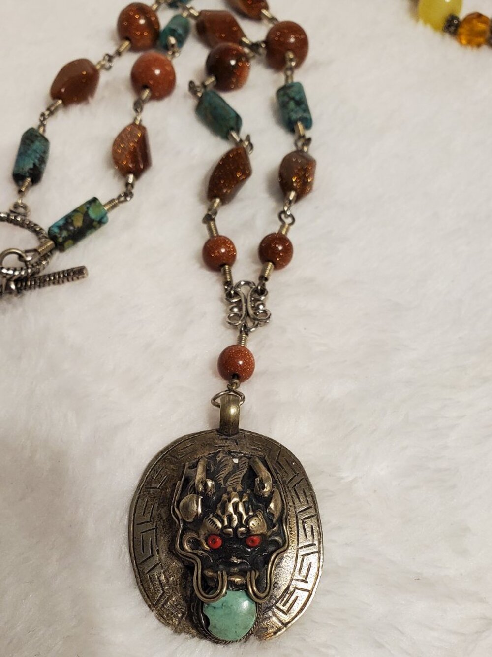 Beautiful Beaded Necklace featuring dragon face Medallion